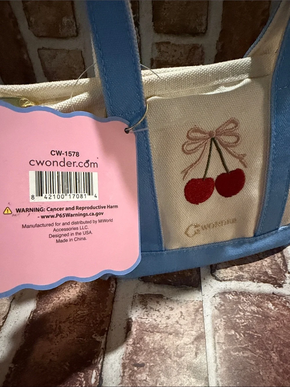 Cream Canvas Tote with Light Blue Trim and Cherry Embroidery by C. Wonder